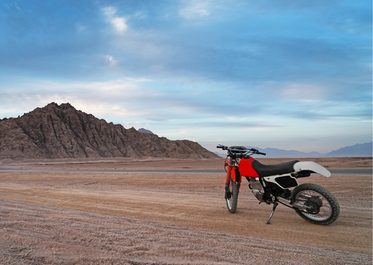 Dualsport motorcycle on a scenic outback highway