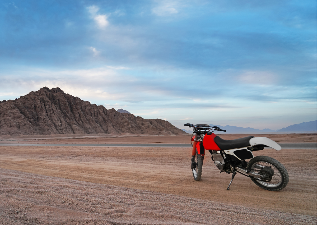 Dualsport motorcycle on a scenic outback highway