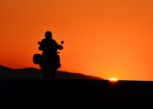 Motorcycle riding in the heat at Darwin sunset